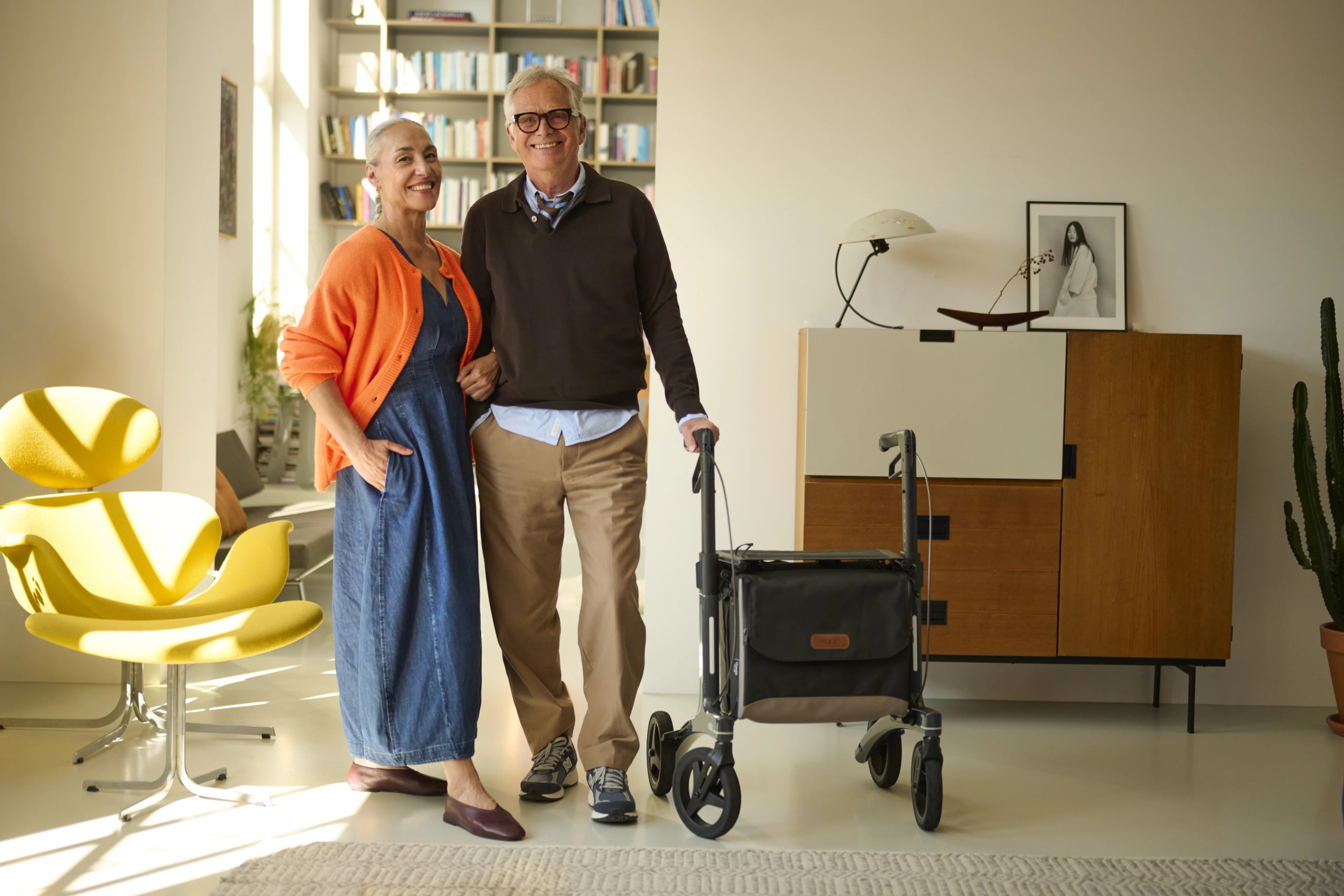 The Rollz Air rollator in a warmly lit interior.